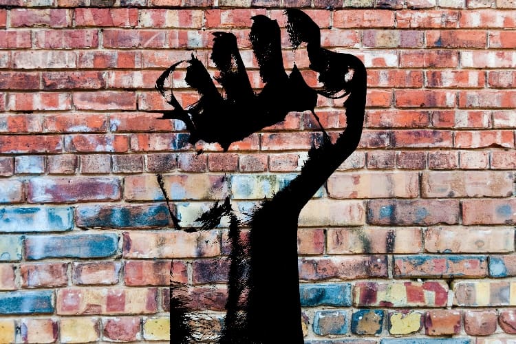 fist-graffiti-on-wall