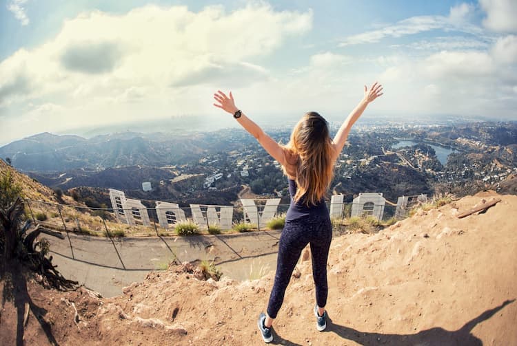 Hiker behind Hollywood Sign