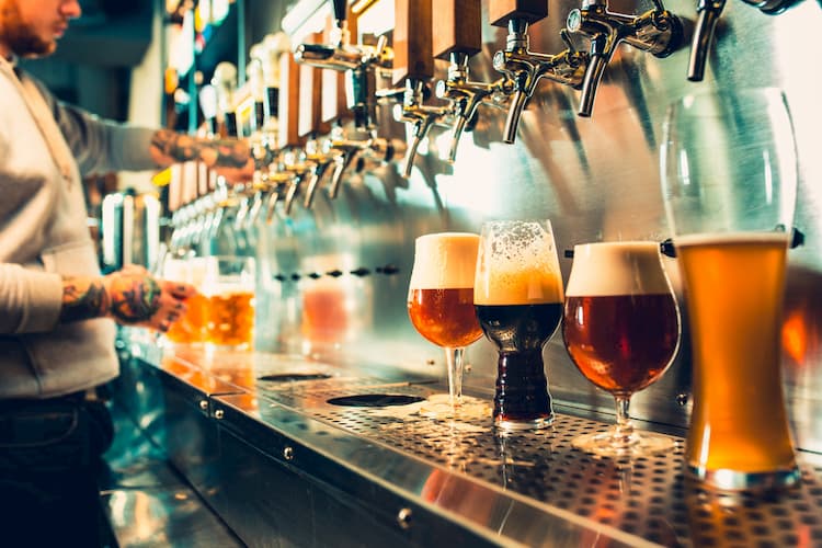 Rows of beers under taps