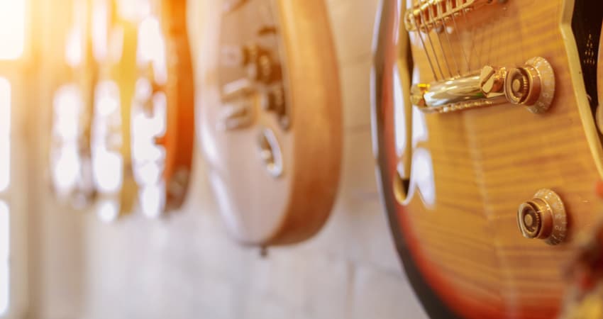 Guitars on display at a music museum