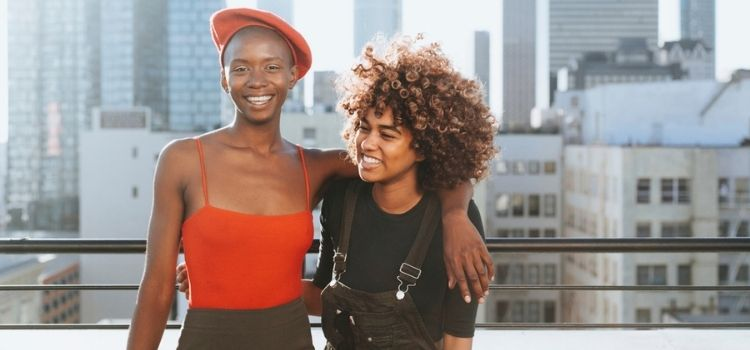 two girls on a rooftop in downtown los angeles