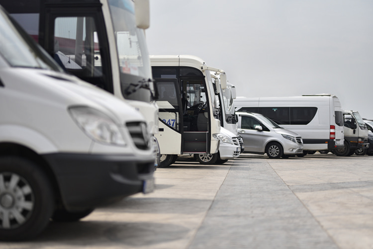 charter bus rentals parked in a lot